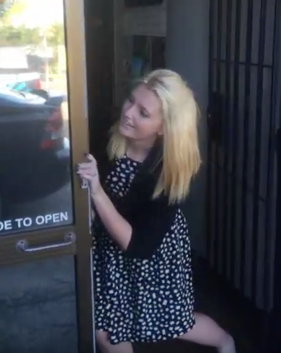 Sliding Door Repairs Bond University Lady trying to open a jammed sliding door